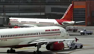ilustrasi pesawat Air India (AP/Kevin Frayer)