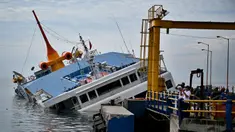 KMP Dharma Rucitra III kandas di Pelabuhan Padang Bai, Karangasem, Bali, Sabtu (13/6/2020). KMP Dharma Rucitra III kandas saat hendak bersandar di Pelabuhan Padang Bai. (SONNY TUMBELAKA/AFP)