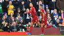 Bek Liverpool, Virgil Van Dijk, merayakan gol yang dicetaknya ke gawang Brighton pada laga Premier League di Stadion Anfield, Liverpool, Sabtu (1/12). Liverpool menang 2-1 atas Brighton. (AFP/Paul Ellis)