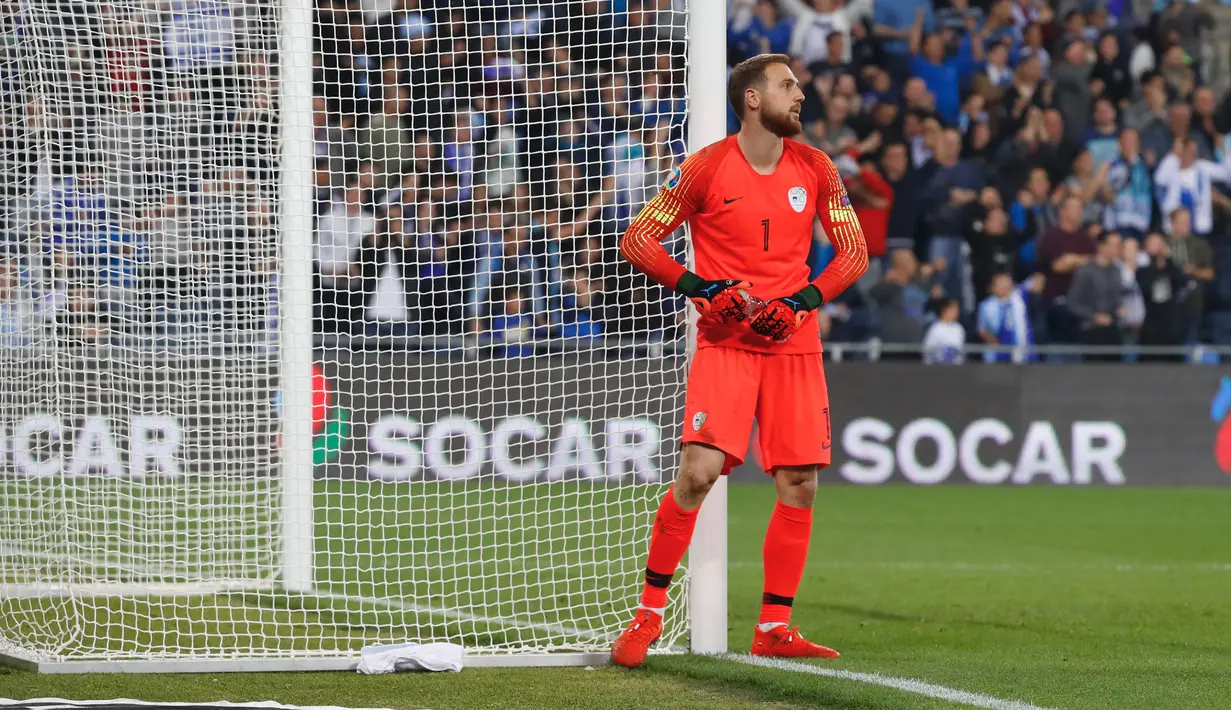 Jan Oblak - Kiper andalan Atletico Madrid ini hanya akan menjadi penonton di Piala Dunia 2022. Timnas Slovenia gagal mengamankan satu tempat ke putaran final lantaran hanya menempati posisi empat klasemen dengan torehan 14 poin. (AFP/Jack Guez)