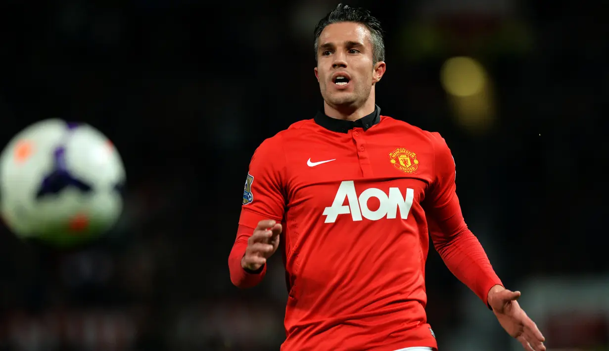 3. Robin van Persie (Belanda): 144 gol. (AFP/Paul Ellis)