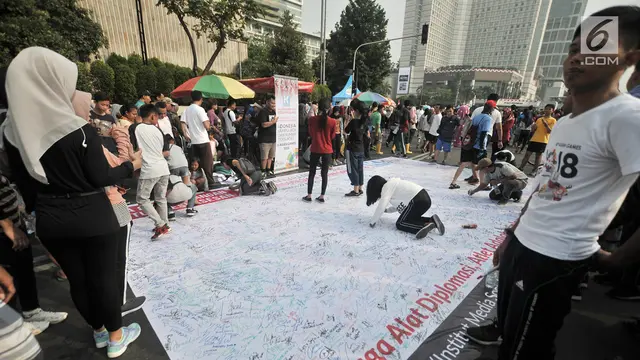 Dukung Atlet Juara Asian Games, Pengunjung CFD Berdoa dan Kumpulkan Tanda Tangan