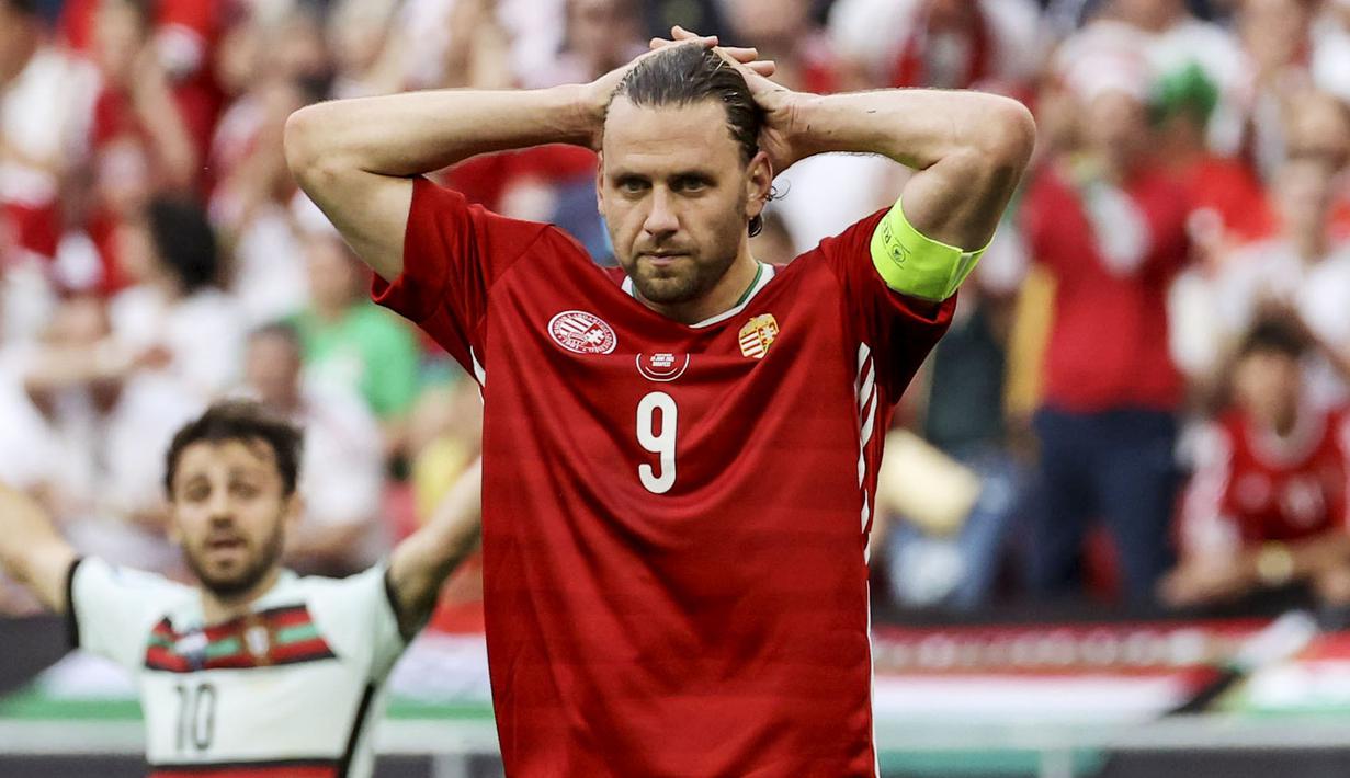 Petaka bagi Hungaria benar-benar terjadi pada menit 84, Portugal akhirnya mampu membobol gawang Hungaria melalui Raphael Guerreiro. (Bernadett Szabo/Pool via AP)