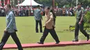 Wapres Jusuf Kalla saat tiba di acara syukuran HUT ke-63 Kopassus di Cijantung, Jakarta, Rabu (29/4/2015). Kopassus mengundang pihak-pihak yang pernah berseteru. (Liputan6.com/Herman Zakharia)