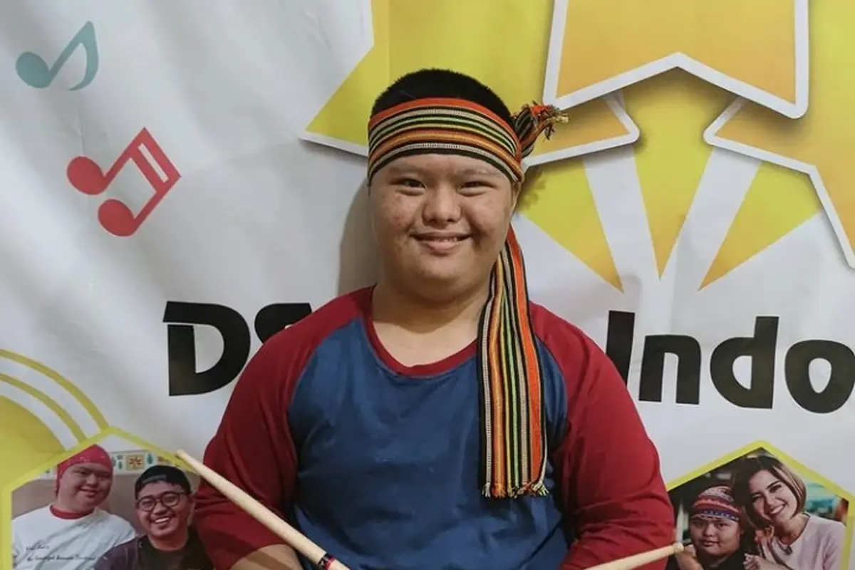 Imansyah Aditya Fitri penyandang down syndrome.