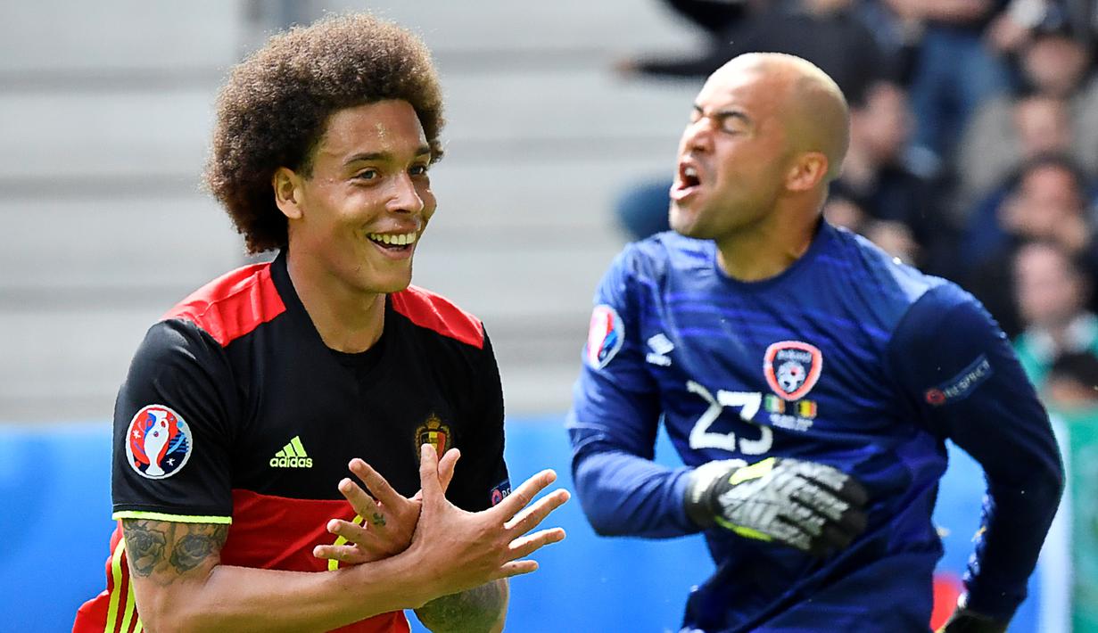 Axel Witsel menyumbang satu gol saat Belgia membungkam Irlandia 3-0, (18/6/2016). Witsel juga melepaskan umpan yang berhasil sebanyak 97%. (AFP/Georges Gobet)