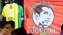 Relawan Bis Kota, begitulah para supir angkot, kondektur, pengamen, pedagang kaki lima, dan tukang ojek menamakan gerakan dukungan mereka buat pasangan Jokowi-JK, (29/5/2014). (Liputan6.com/Faizal Fanani)