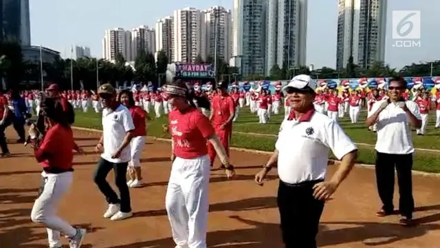 Kepala KSP dan Menaker menghadiri perayaan May Day yang diadakan di GOR Soemantri, Jakarta.