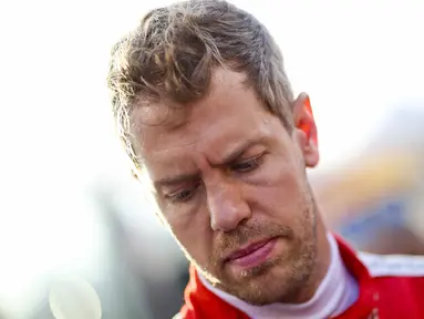 Sebastian Vettel yang mengendarai Scuderia Ferrari menjadi tercepat dari 126 laps dengan waktu 1m 22.810s pada hari ke-2 sesi tes pramusim di Sirkuit Catalunya, Barcelona, Selasa (23/2/2016) malam WIB.  (EPA/Srdjan Suki)