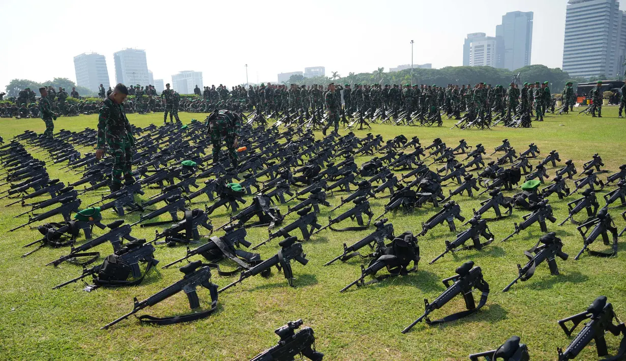 Kesepuluh satuan tugas (satgas) tersebut akan ditempatkan dalam tiga ring pengamanan. (AP Photo/Tatan Syuflana)