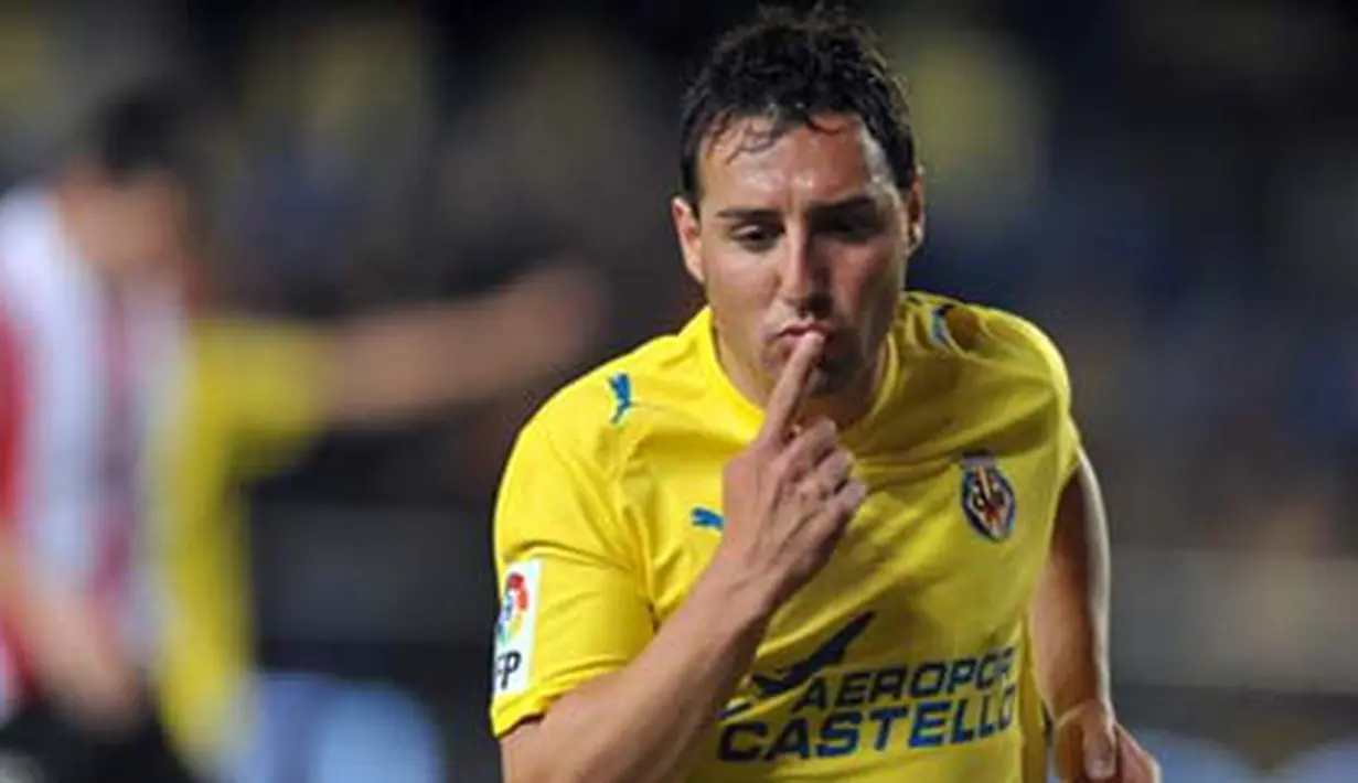 Kegembiraan gelandang Villarreal, Santi Cazorla setelah mencetak gol ke gawang Athletic Bilbao dalam lanjutan La Liga yang berlangsung di Madrigal Stadium, Villarreal, 21 Maret 2009. AFP PHOTO/DIEGO TUSON 