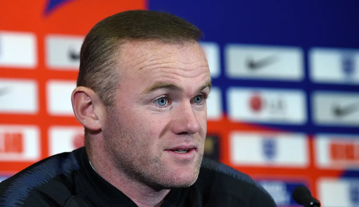 Sebelumnya, Wayne Rooney dikabarkan sempat menolak panggilan tersebut. Rooney beralasan hanya ingin mendapatkan waktu yang tepat untuk tampil bersama timnas Inggris. (AFP/Paul Ellis)