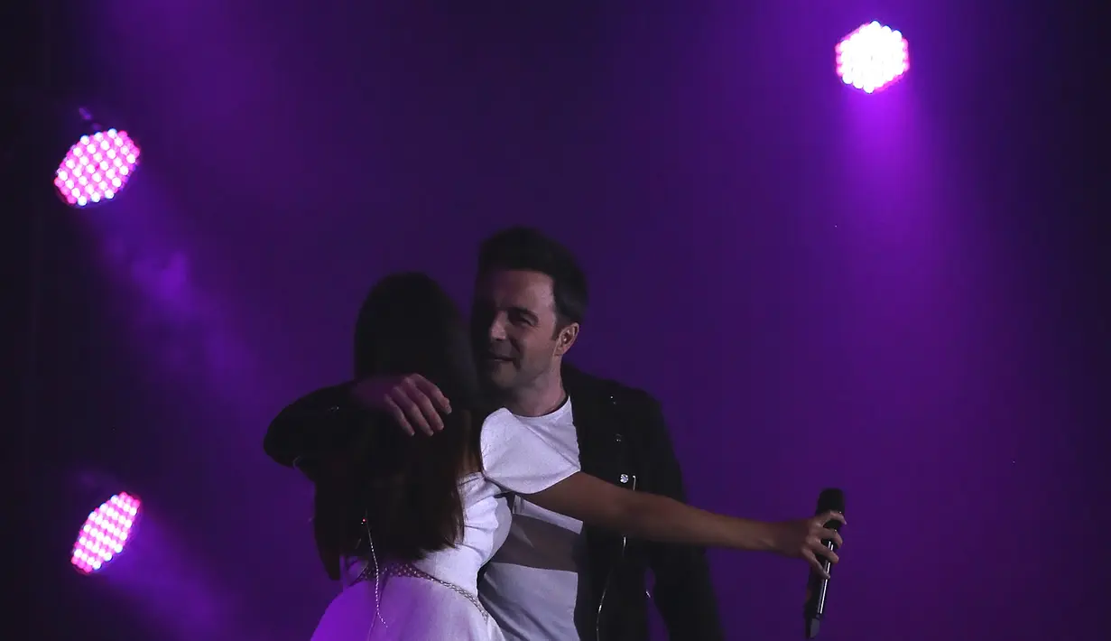 Diakui Shane Filan, para penggemarnya yang hadir saat itu berhasil membuat penyanyi berusia 37 tahun tersenyum sumringah.  (Bambang E. Ros/Bintang.com)