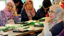 Para peserta tampak serius mengikuti penjelasan mentor tentang tips dan trip cantik berhijab. (Liputan6.com/Faisal R Syam)