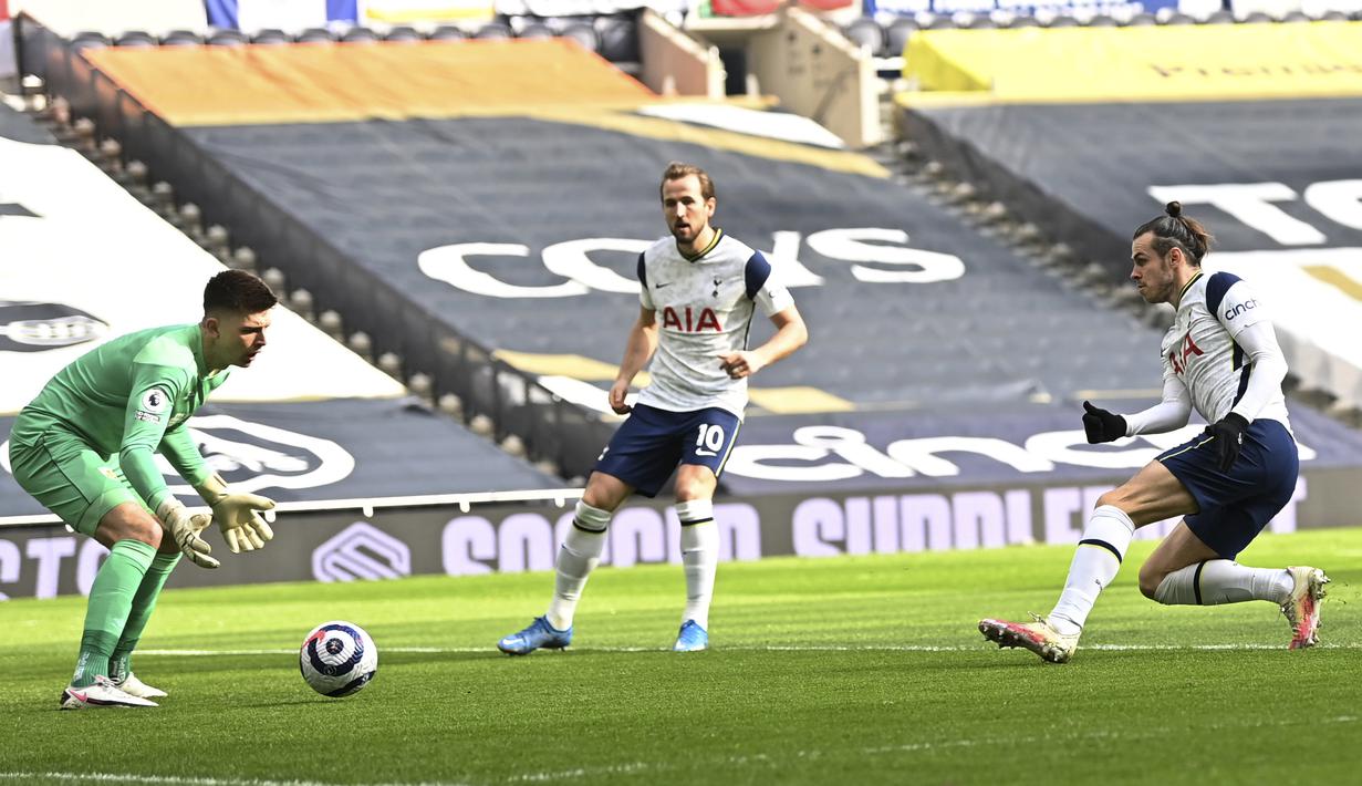 Setelah itu, Bale terlibat lagi dalam terciptanya gol kedua tuan rumah. Pada menit ke-15, Bale memberikan umpan matang kepada Harry Kane yang bisa dikonversikan menjadi gol. (Foto: AP/Pool/Daniel Leal Olivas)