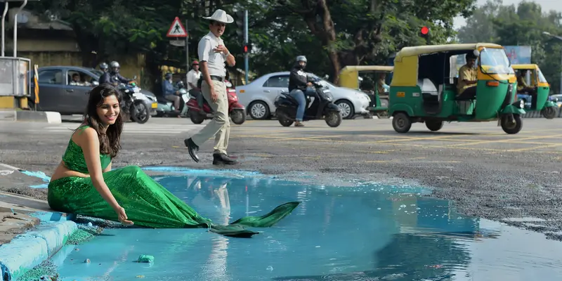 Cara Seniman India Memprotes Jalan Berlubang