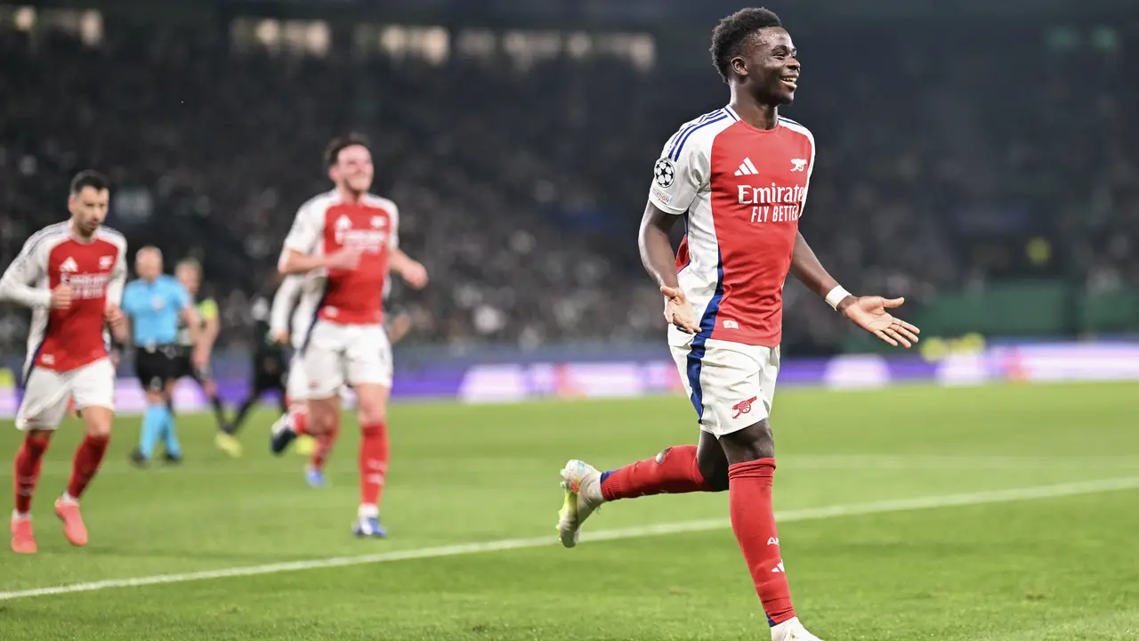 Selebrasi pemain Arsenal ketika mencukur Sporting di Liga Champions