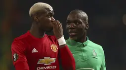  Jose Mourinho, meyakini duel Pogba bersaudara, Florentin dan Paul Pogba pada leg pertama 32 besar Liga Europa akan membuat sang ibu pusing. Sebab, ibu Pogba bakal sulit mendukung salah satu dari dua anaknya tersebut. (AP/Dave Thompson)