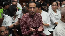 Mantan Menteri Pendidikan, Kebudayaan, Riset, dan Teknologi (Mendikbudristek), Nadiem Anwar Makarim, yang juga salah satu pendiri platform pembayaran dan perusahaan transportasi daring di Indonesia, bereaksi sebelum dimulainya sidang pembacaan tuntutan di Pengadilan Tindak Pidana Korupsi Jakarta, Rabu 13 Mei 2026. (AP Photo/Tatan Syuflana)