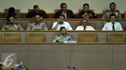 Komjen (Pol) Tito Karnavian saat mengikuti sidang paripurna di Jakarta, Senin (27/6). Setelah dinyatakan layak dan disahkan paripurna, nama Komjen Tito akan diserahkan ke Presiden untuk dilantik jadi kapolri. (Liputan6.com/Johan Tallo)