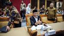 Plt Menpora Muhadjir Effendy mengikuti rapat kerja dengan Komisi X DPR di Kompleks Parlemen, Senayan, Jakarta, Selasa (28/3/2023). (Liputan6.com/Faizal Fanani)