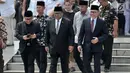 Ketua MPR Zulkifli Hasan (kanan), Ketua DPD Oesman Sapta Odang (tengah), dan Ketua Umum PKB Muhaimin Iskandar menghadiri pemakaman Presiden ke-3 RI BJ Habibie di TMP Kalibata, Jakarta, Kamis (12/9/2019). Habibie dikebumikan di sebelah makam istri tercinta, Ainun Aini. (merdeka.com/Iqbal Nugroho)