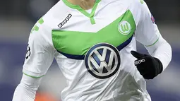 1. Julian Draxler, kegagalan Arsenal pada laga perdana Liga Inggris membuat Arsene Wenger bersikeras mendatangkan gelandang Jerman ini. Situs TransferMarketWeb, mengabarkan jika The Gunners menyiapkan dana sebesar 35 juta pounds. (AFP/Yorick Jansens)