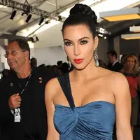 Bicara soal penampilan, Kim Kardashian memang selalu tampil berani. Terlebih urusan memamerkan lekuk tubuhnya yang seksi. Pasalnya, hal ini sering ia lakukan di setiap kesempatan. (AFP/LARRY BUSACCA)