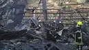 <p>Angkatan Udara Ukraina mengatakan mereka menghancurkan tiga rudal dan sembilan drone dalam semalam. (Ukrainian Emergency Situation Press Office via AP)</p>
