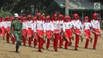 Sejumlah calon anggota Pasukan Pengibar Bendera (Paskibra) Nasional 2019 mengikuti latihan baris berbaris di Lapangan PPPON Cibubur, Jakarta, Selasa (30/7/2019). Hari ke-3 diklat, calon Paskibraka berlatihan formasi baris-berbaris, pengibaran dan penurunan bendera. (Liputan6.com/Herman Zakharia)