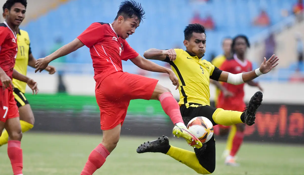 Timnas U-23 menang melalui adu penalti dengan skor 4-3 setelah sebelumnya bermain imbang 1-1 pada waktu normal. (AFP/ Ye Aung Thu)
