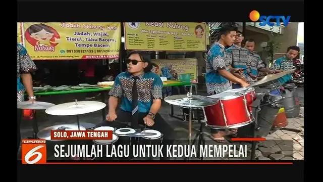Meriahkan hari pernikahan Kahiyang-Bobby, Relawan Jokowi hibur warga dengan pertunjukan musik. Seperti apa?