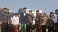 Presiden Joko Widodo (Jokowi) usai menjadi pembina apel peringatan Hari Santri Nasional di Tugu Pahlawan Surabaya, Jawa Timur. (Liputan6.com/Dicky Agung Prihanto)