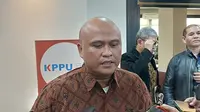 Anggota Komisi Pengawas Persaingan Usaha (KPPU) Hilman Pujana di Kantor KPPU, Jakarta, Rabu (28/2/2024). (Arief/Liputan6.com)