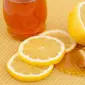 Hilangkan leher hitam dengan lemon dan madu. (via: inetarticle.com)