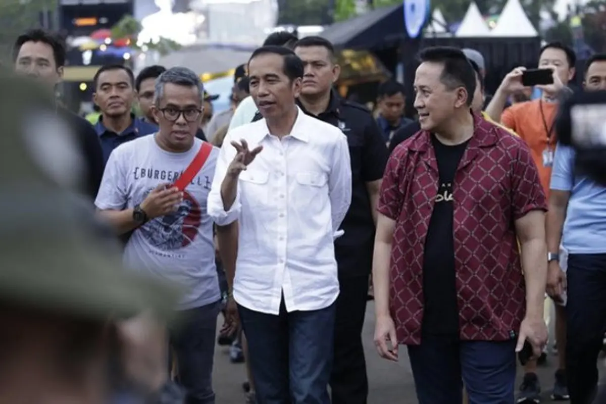 Didampingi Triawan Munaf, Jokowi menghadiri WTF 2018. (KapanLagi.com/Agus Apriyanto)