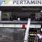 Petugas mengecek alat LNG di salah satu pusat perbelanjaan di Balikpapan, Kalimantan Timur, (27/10/2015).  Untuk mempertahankan komitmennya, PT. Pertamina Gas (Pertagas) menyalurkan LNG untuk kebutuhan mal besar. (Liputan6.com/Immanuel Antonius)