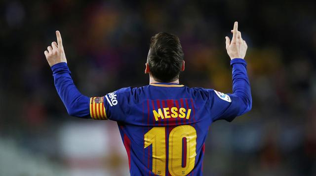 Striker Barcelona, Lionel Messi, melakukan selebrasi usai mencetak gol ke gawang Leganes pada laga La Liga di Stadion Camp Nou, Sabtu (7/4/2018). Barcelona menang 3-1 atas Leganes. (AP/Manu Fernandez)