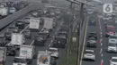 Arus lalu lintas di Jalan Gatot Subroto, Jakarta, Selasa (2/5/2023). (Liputan6.com/Herman Zakharia)