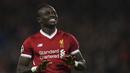 <p>Sadio Mane merupakan salah satu winger terbaik dalam beberapa musim terakhir. Meski Liverpool gagal meraih gelar Liga Champions pada musim 2017/18, Mane merupakan mesin gol untuk The Reds. Bintang Senegal tersebut berhasil melesatkan tujuh gol dalam tujuh laga fase gugur di Liga Champions pada musim tersebut. (AFP/Paul Ellis)</p>