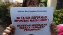 Aliansi Perempuan Indonesia (API) saat menggelar aksi unjuk rasa memperingati 28 tahun Reformasi di depan kantor Komisi Nasional (Komnas) Hak Asasi Manusia (HAM), Jakarta, Selasa (19/5/2026). (Kapanlagi.com/Budy Santoso)
