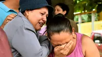 Keluarga korban kerusuhan penjara di Honduras. Dok: AFP