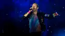 Vokalis dari band rock Inggris Coldplay, Chris Martin tampil pada festival musik Rock in Rio di Rio de Janeiro, Brasil, Minggu (11/9/2022). (AP Photo/Bruna Prado)