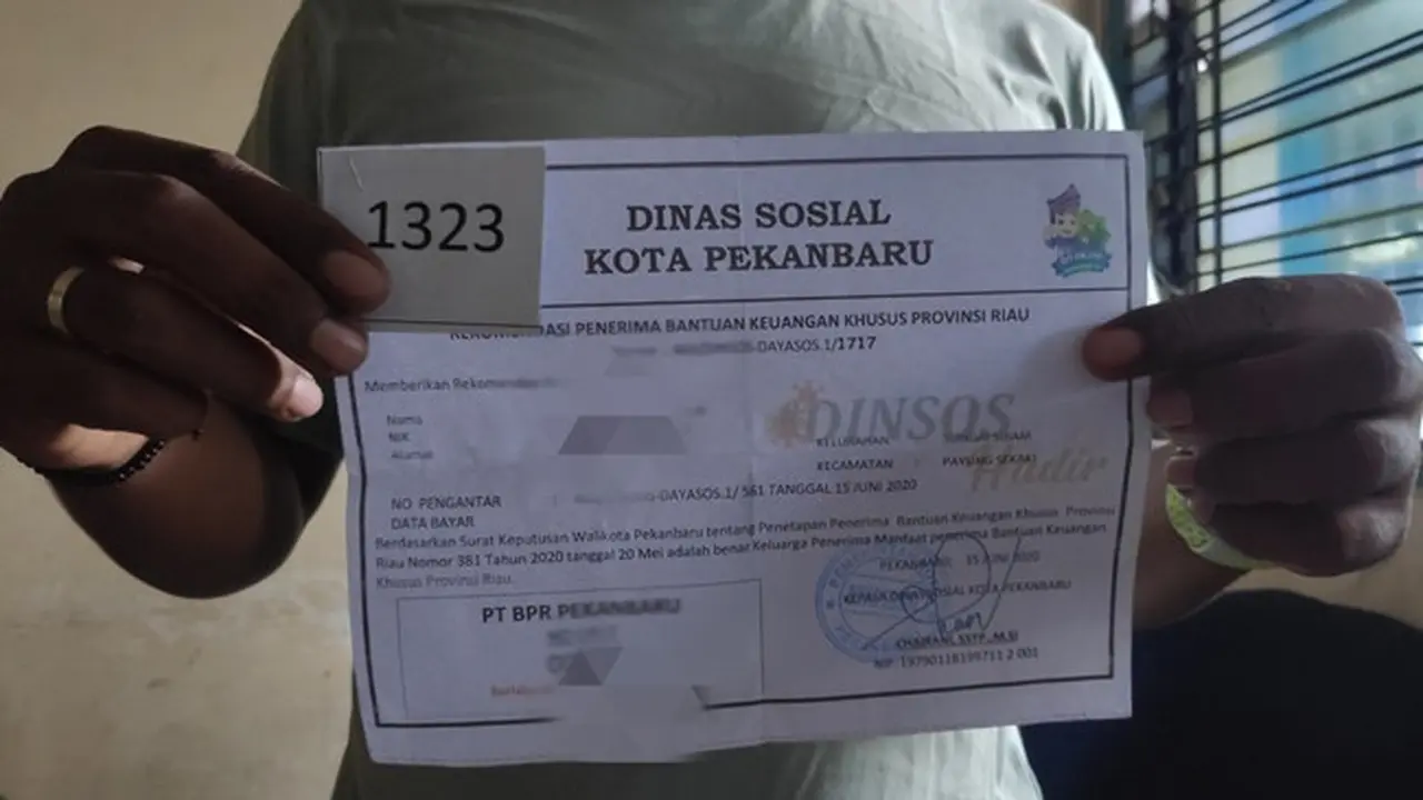 Blangko pengambilan bantuan keuangan bagi warga terdampak Covid-19 di Pekanbaru.