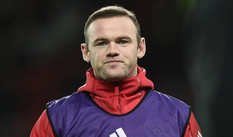 Kapten MU Wayne Rooney lebih banyak jadi cadangan musim ini. (AFP/Oli Scarff)