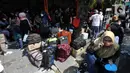 Pemudik sudah memadati Terminal Kalideres sebelum cuti bersama Lebaran 2023 dimulai. (Liputan6.com/Johan Tallo)