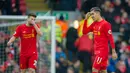 Ekspresi kecewa pemain Liverpool, Roberto Firmino (kanan) dan Adam Lallana (kiri) usai kalah dari Swansea City pada lanjutan Premier League di Anfield, Liverpool, (Sabtu (21/1/2017). Liverpool kalah 2-3.  (EPA/Peter Powell)