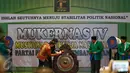 Mendagri Tjahjo Kumolo beserta Menteri Hukum dan HAM RI Yasonna Hamonangan Laoly saat membuka Mukernas ke-IV PPP di Jakarta, (24/2). (Liputan6.com/Faizal Fanani)