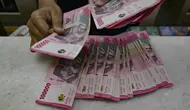Dolar Singapura Hari Ini Rp 14.130, Ringgit Malaysia di Level Rp 4.421