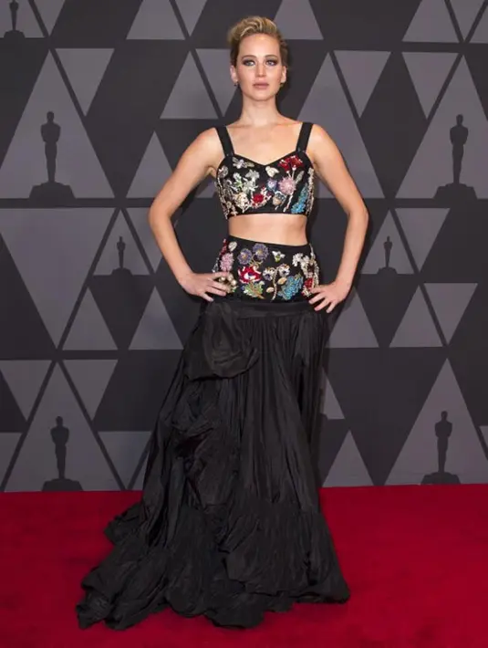 “Saat kejadian itu, aku benar-benar tak menyangka dan tak bisa mengutarakan perasaanku lewat kata-kata. Sampai saat ini, aku masih mengurus kejadian itu,” pungkas Jennifer Lawrence. (AFP/Valerie Macon)